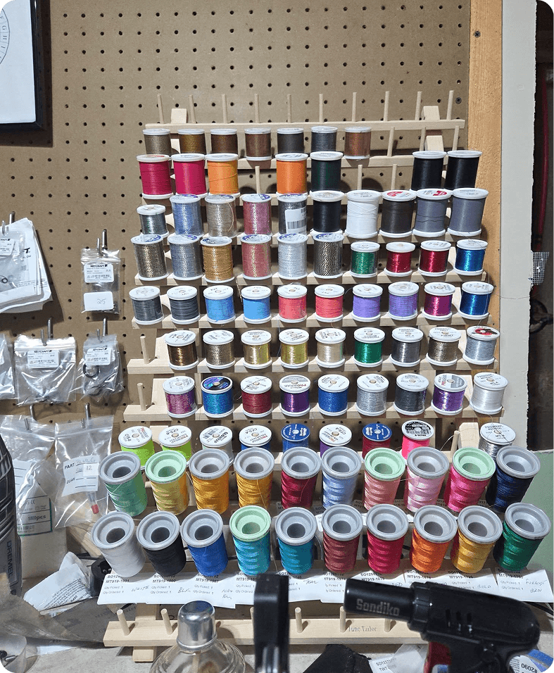 Assorted sewing threads neatly organized